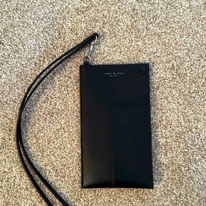 Tory Burch NWOT phone case/wristlet. Measures 4x6.75”